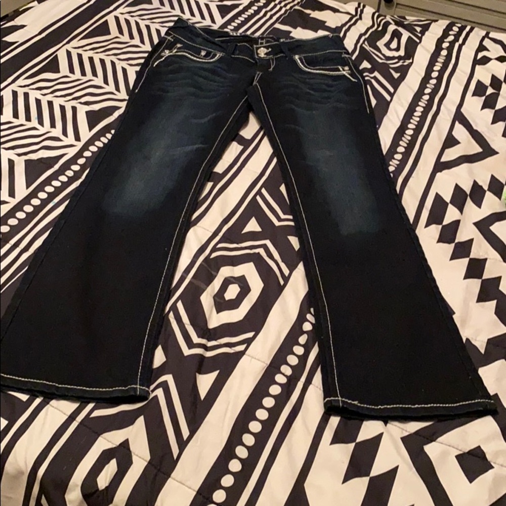 Dark denim studded pockets jeans